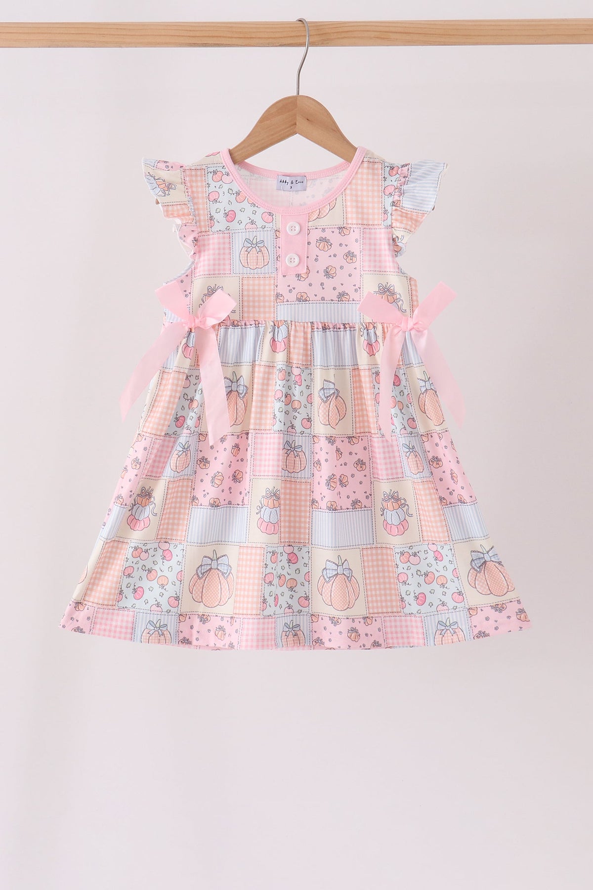 Pink pumpkin print ruffle dress