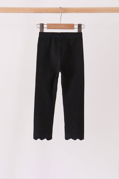 Black scalloped leggings