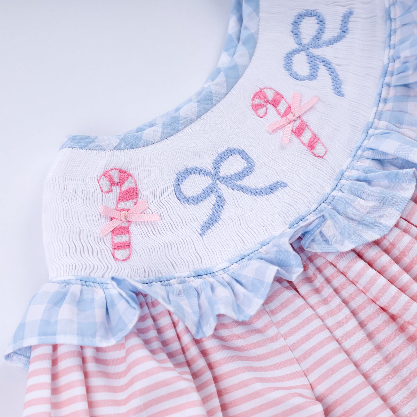 Pink candy cane bow hand smocked ruffle dress