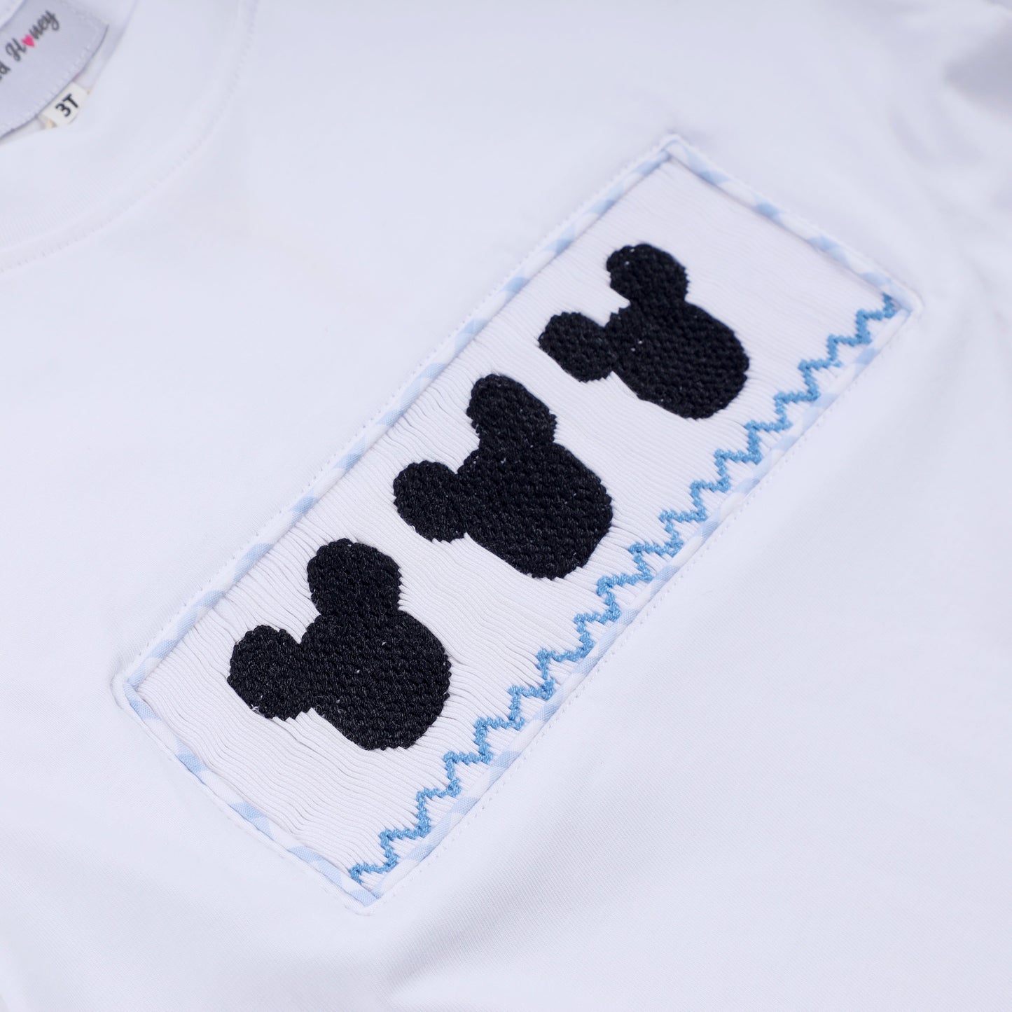 Blue character hand smocked gingham shorts set